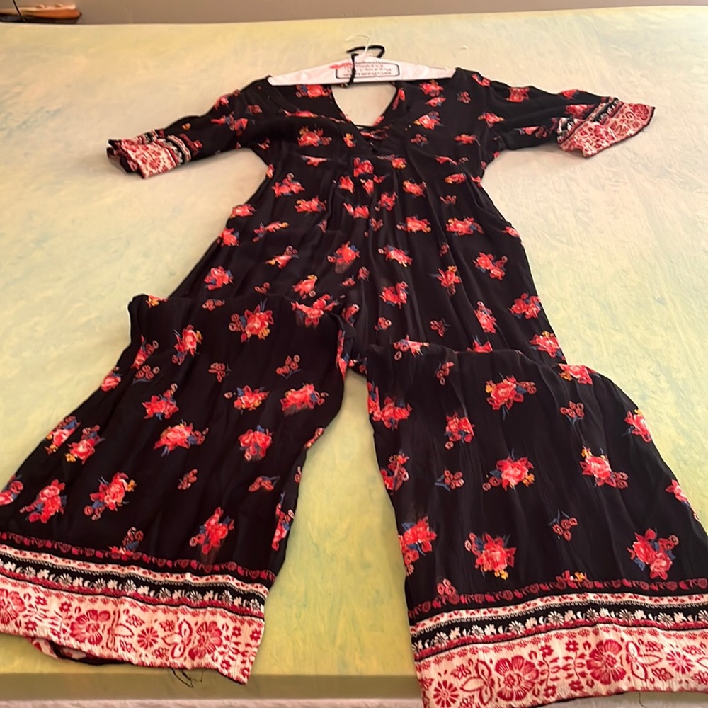 Size L black jumpsuit with flowers